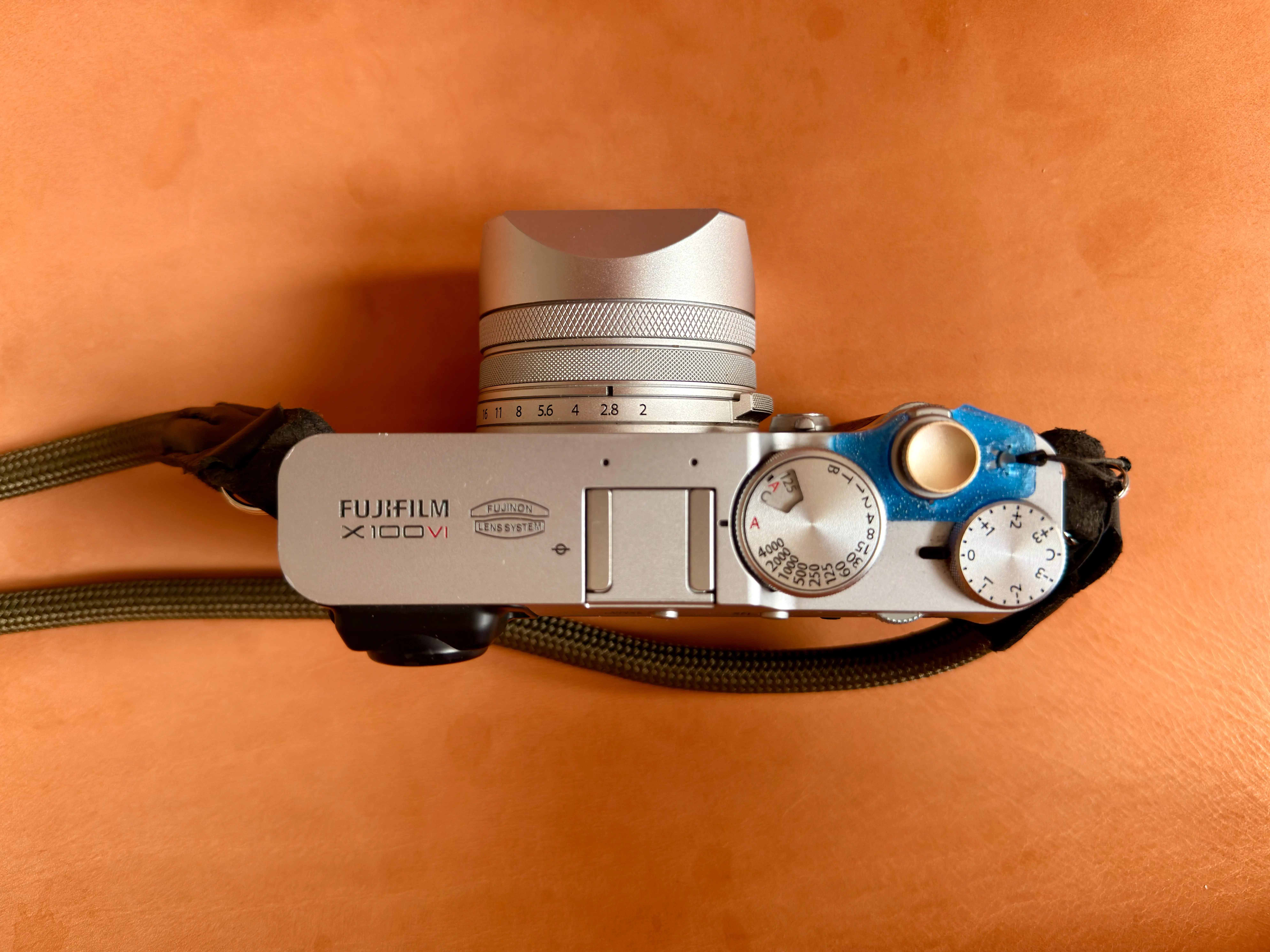 Atelier Reel's Power Switch Lock Clip for the Fujifilm X100VI